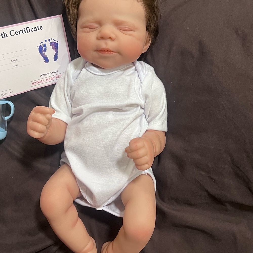 Realistic Baby Doll in White Onesie